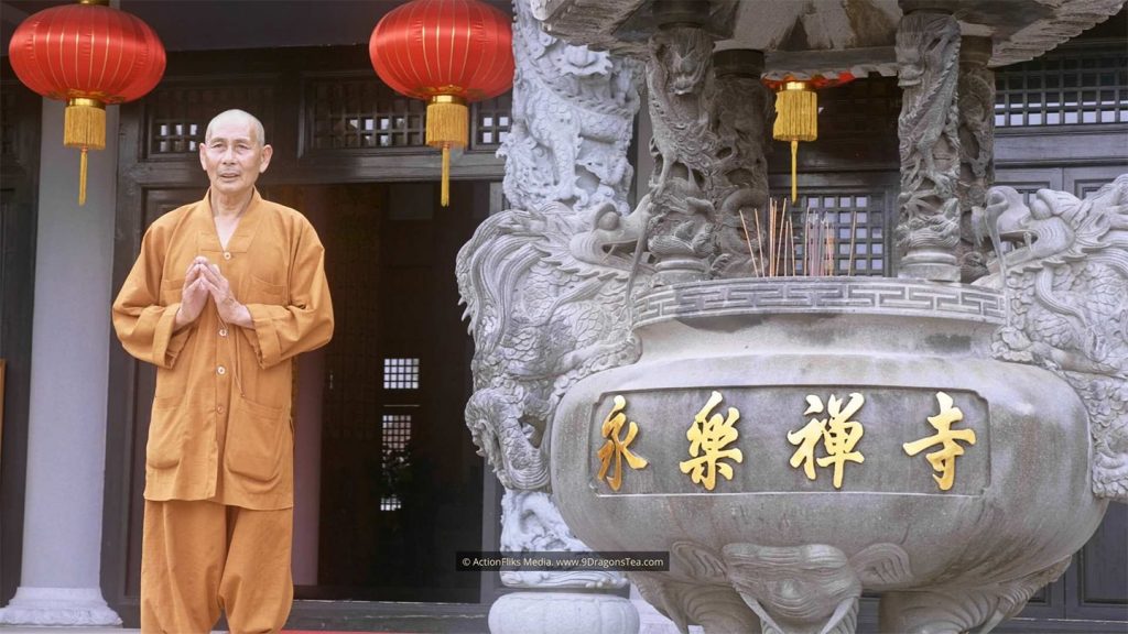 chinese tea history wuyishan culture Buddhist Monk Standing In Front of Mother Temple